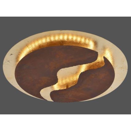 Okrúhle stropné svietidlo s hrdzavohnedým stredom a zlatým okrajom, svieti pomocou LED diód umiestnených po obvode. Svetlo presvitá cez otvory v hnedom stredovom dieli.