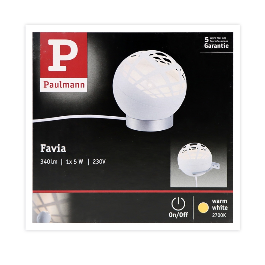 Biela stolová lampa tvaru gule s perforáciou svieti. Balenie uvádza: Favia, 340 lm, 1x 5 W, 230 V, 5-ročná záruka, teplá biela (2700 K).