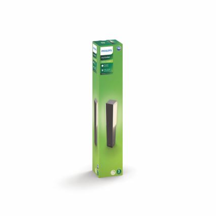 Balenie vonkajšieho LED svietidla Philips myGarden. Svietidlo je zobrazené v balení, ktoré je vysoké a úzke, na zelenej podložke.