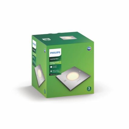 Záhradné LED svetlo Philips myGarden je v kartónovej krabici. Svetlo je zapustené do kovového štvorcového puzdra. Krabica obsahuje informácie: 25 000 hodín, 25 rokov, vysokokvalitné diódy.