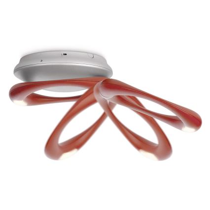 Svietidlo s červenými ramenami sa spája s kruhovou striebornou základňou. Ramenné svietidlo svieti vďaka zabudovaným svetlám. Zariadenie je pripevnené k stropu.