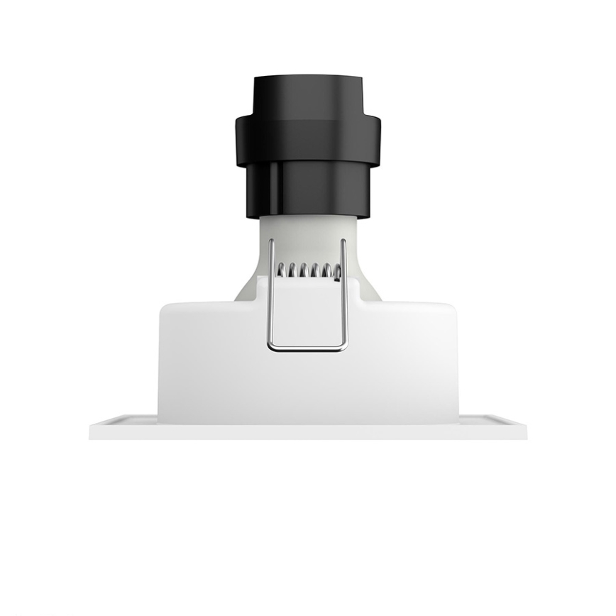 Svietidlo je umiestnené v bielom štvorcovom ráme. Svietidlo má čierny vrchný kryt a kovový držiak. Je zobrazené na bielom pozadí.