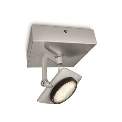 Stropné svietidlo s otočnou hlavou smeruje dopredu. Svietidlo je striebornej farby a pripevnené k štvorcovému nástennému držiaku. Hlavica svietidla obsahuje LED diódu.