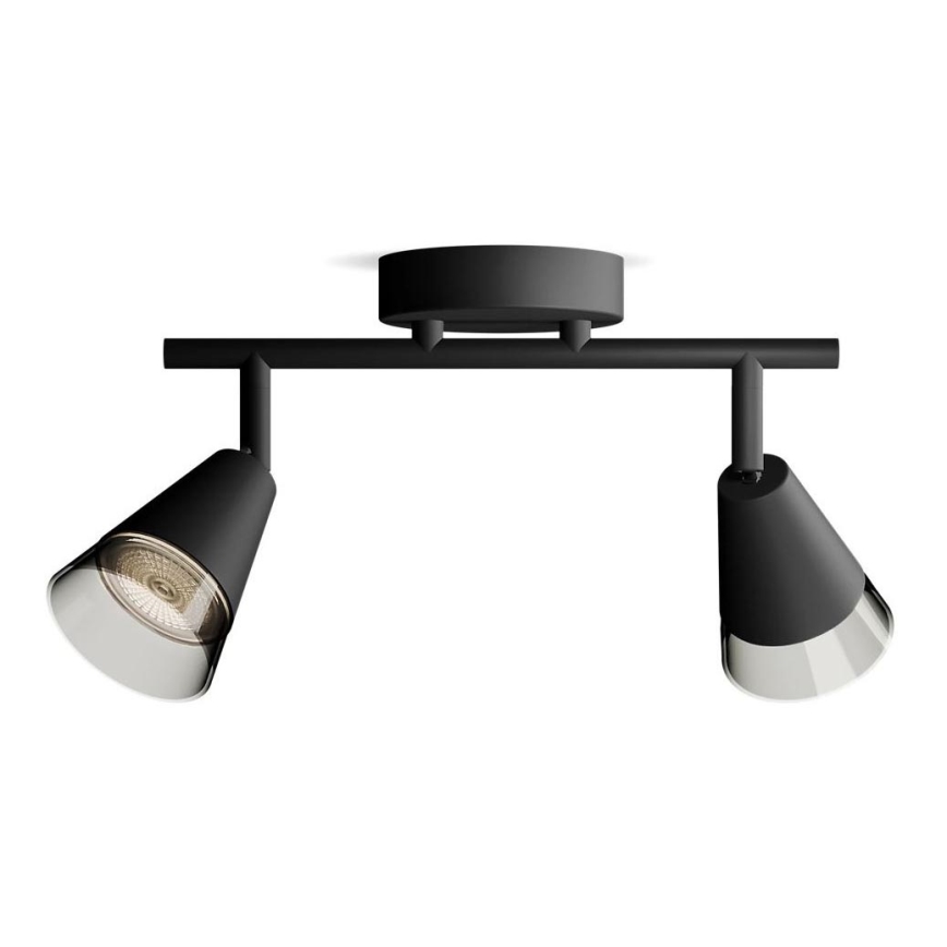 Dvojité stropné svietidlo s čiernymi kužeľovitými tienidlami a priesvitnými difúzormi je pripevnené k stropu pomocou čiernej tyče. Svietidlá sú otočné.