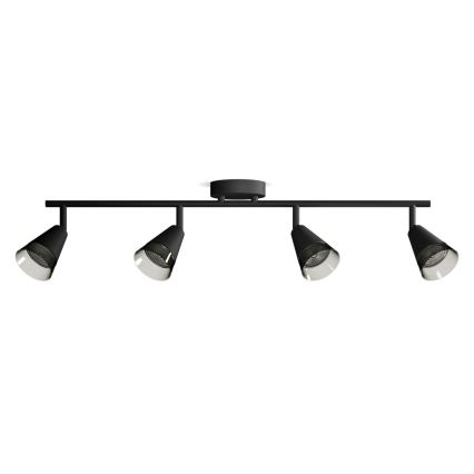 Čierno sfarbená stropná lampa s tromi otočnými reflektormi s kužeľovitými tienidlami je pripevnená na čiernej lište. Reflektory sú smerované dopredu. Lampa je na bielom pozadí.