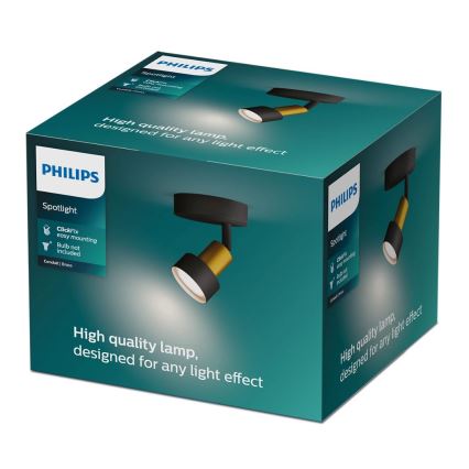 Balenie s bodovým svietidlom Philips. Svietidlo je čierne s zlatou časťou, na obrázku je zobrazené pripevnené na stene. Na balení je uvedené: High quality lamp, designed for any light effect, ClickFix easy mounting, Bulb not included, Conduit | Brass.