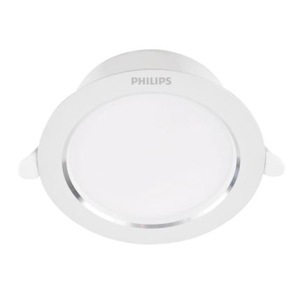 Svietidlo Philips je zobrazené zhora. Má biely plastový kryt s tenkým strieborným lemom a dvoma malými výstupkami na bokoch. Na vrchu je vyrazené logo PHILIPS.