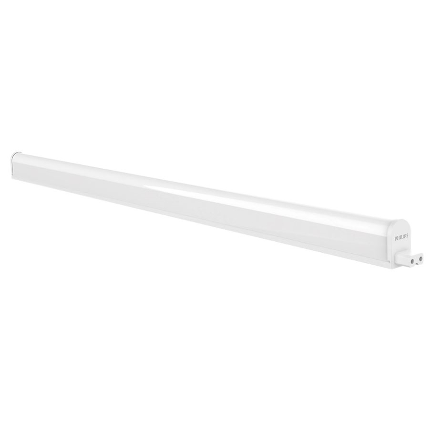LED trubica Philips svieti. Je umiestnená na bielom pozadí. Na jednom konci je viditeľná zástrčka.