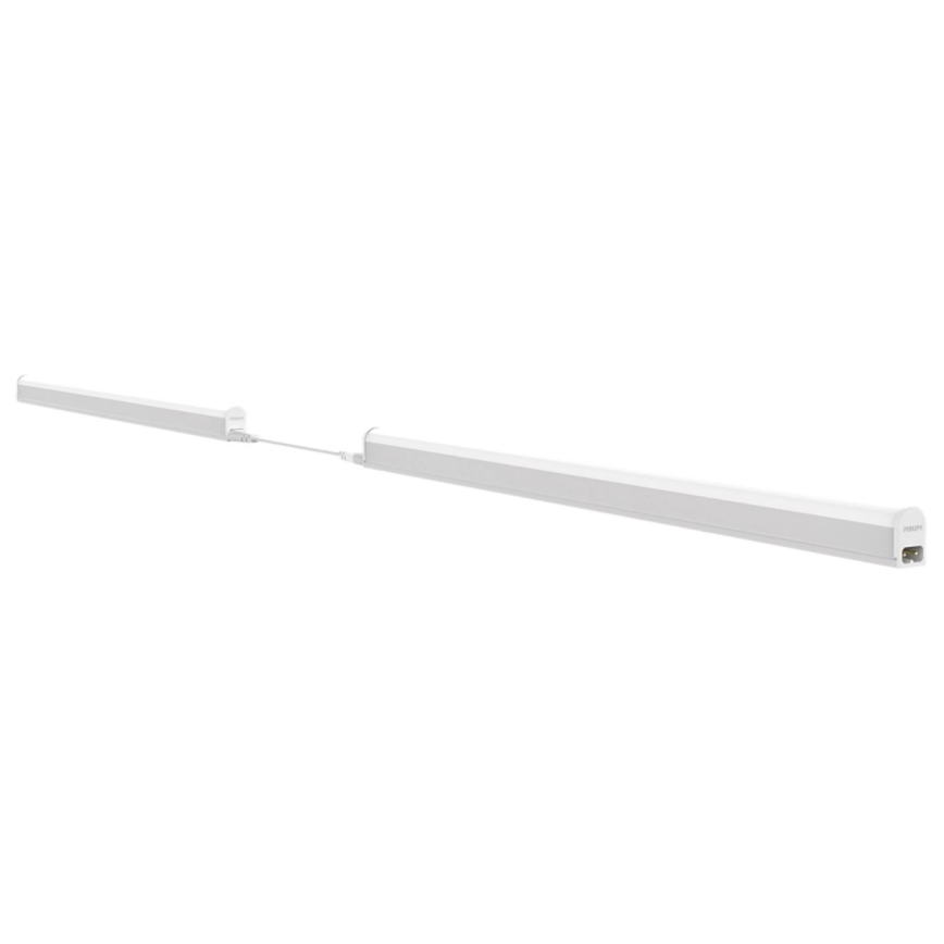 Dve LED trubice svietia v bielom prostredí. Trubice sú spojené káblom. Jedna trubica je pripojená do elektrickej siete.