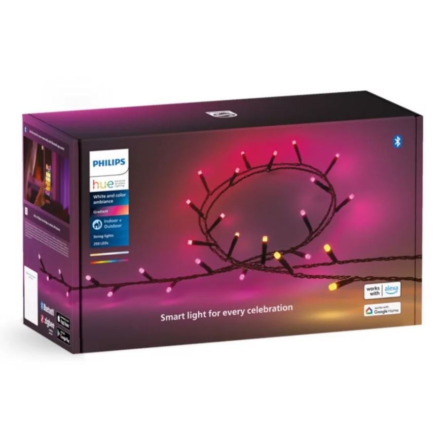 Balenie inteligentných svetiel Philips Hue. Obsahuje 250 LED žiaroviek na šnúre, ktoré menia farbu. Balenie je fialovo-ružové s obrázkom rozsvietených svetiel. Text uvádza: „Inteligentné svetlo pre každú oslavu“. Svietidlá sú vhodné do interiéru aj exteriéru.