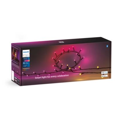 Balenie inteligentných svetiel Philips Hue s farebnými LED diódami v rôznych odtieňoch ružovej a žltej. Svetlá sú zobrazené ako ozdobné osvetlenie. Na balení je uvedené: „Smart light for every celebration“.