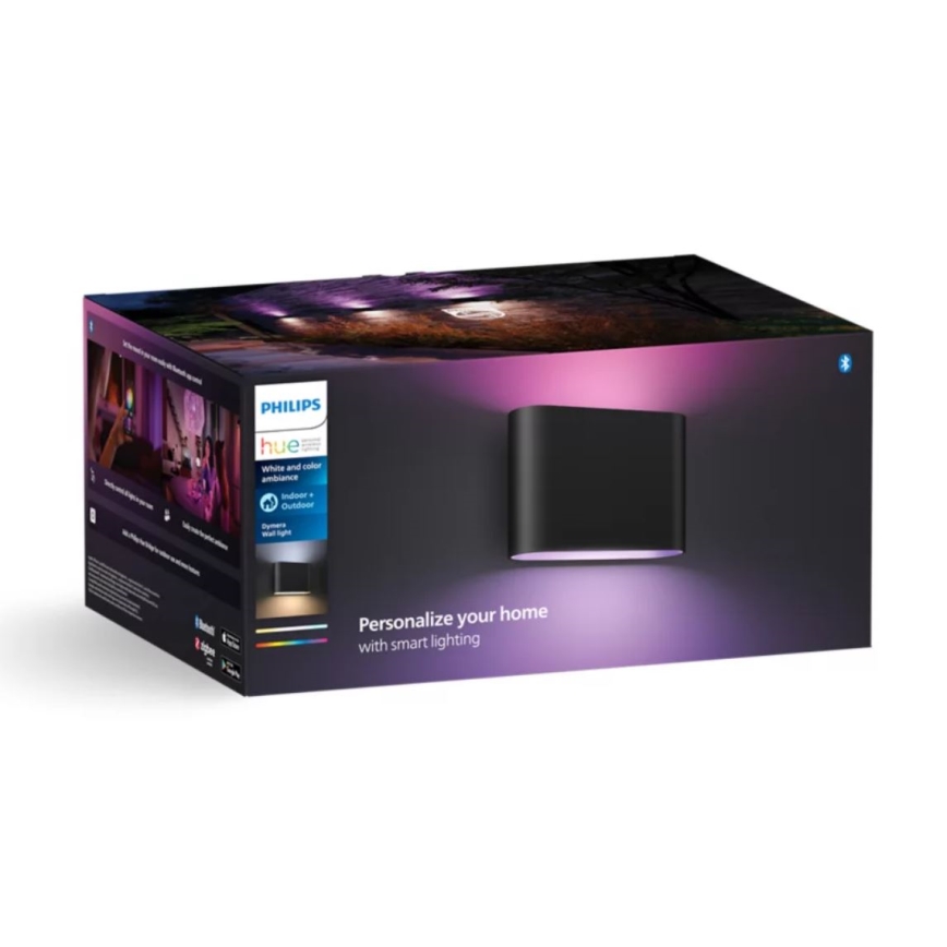 Čierne nástenné svietidlo Philips Hue je zobrazené na obale. Svietidlo svieti v rôznych farbách. Balenie obsahuje informácie o kompatibilite vnútorného a vonkajšieho použitia a text: „Personalize your home with smart lighting.“