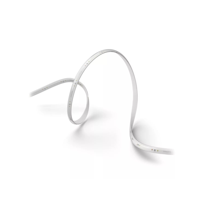 LED pásik je stočený na bielom pozadí. Pásik je svetlosivý a obsahuje malé diódy. Na konci pásika je viditeľné logo Philips.