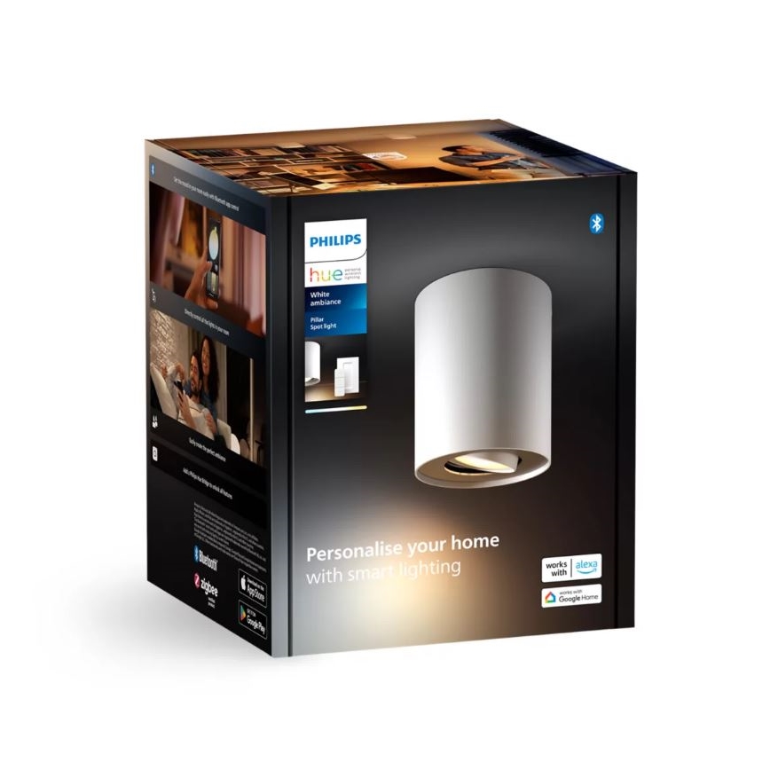 Balenie inteligentného osvetlenia Philips Hue White Ambiance. Obsahuje cylindrické nástenné svietidlo. Balenie prezentuje možnosť personalizácie domáceho osvetlenia. Text: „Personalise your home with smartlighting“, „Works with Alexa, Google Home“.