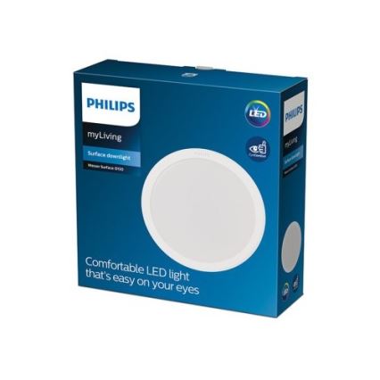 Okrúhle LED svietidlo Philips myLiving, zabalené v modro-bielej krabici, je zobrazené na prednej strane obalu. Text na krabici uvádza: „PHILIPS myLiving Surface downlight Mean Surface D110 Comfortable LED light that's easy on your eyes“.