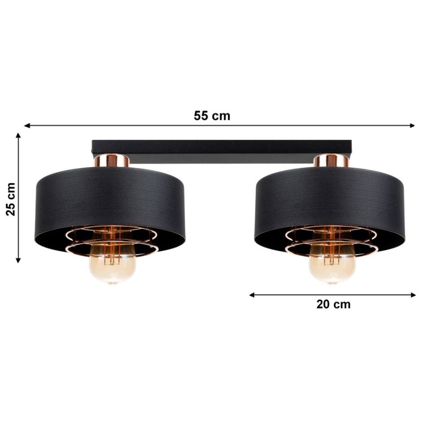 Dvojité stropné svietidlo s čiernymi tienidlami a medenými detailmi je pripevnené k čiernej lište. Rozmery: 55 cm (šírka), 25 cm (výška), 20 cm (vzdialenosť medzi tienidlami). Svietidlo obsahuje dve žiarovky.