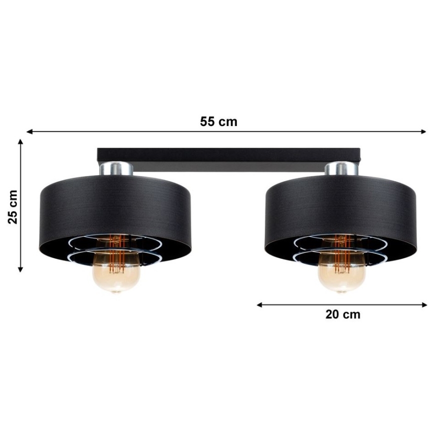 Dvojité stropné svietidlo s dvoma čiernymi tienidlami a žiarovkami. Svietidlo je pripevnené k čiernej tyči. Rozmery: 55 cm (šírka), 25 cm (výška), 20 cm (vzdialenosť medzi tienidlami).