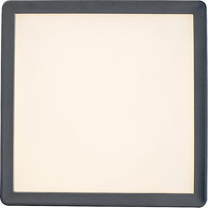 Štvorcové svietidlo s jemne svetlosivým rámom a krémovou plochou svieti. Svietidlo je izolované na bielom pozadí.