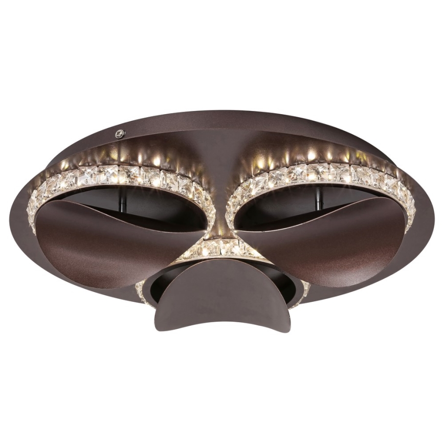 Svietidlo svieti. Je bronzovo-hnedé, okrúhle, s tromi výstupkami a lemované kryštálikmi. Upevnenie na strop.