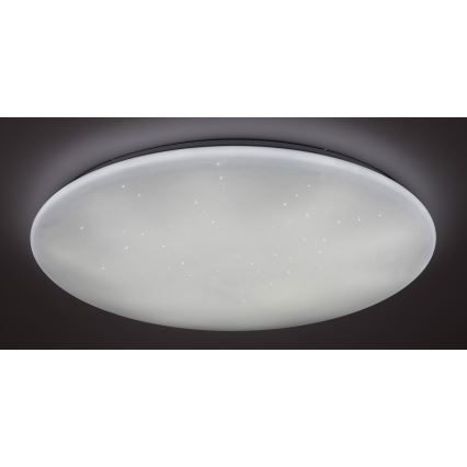 Okrúhle stropné LED svietidlo svieti jemným svetlom. Množstvo malých svetielok imituje hviezdnu oblohu. Svietidlo je namontované na tmavom strope.