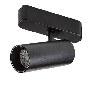 Svietidlo svieti. Je čierne, valcovitého tvaru, pripevnené k obdĺžnikovému držiaku. Biele pozadie.