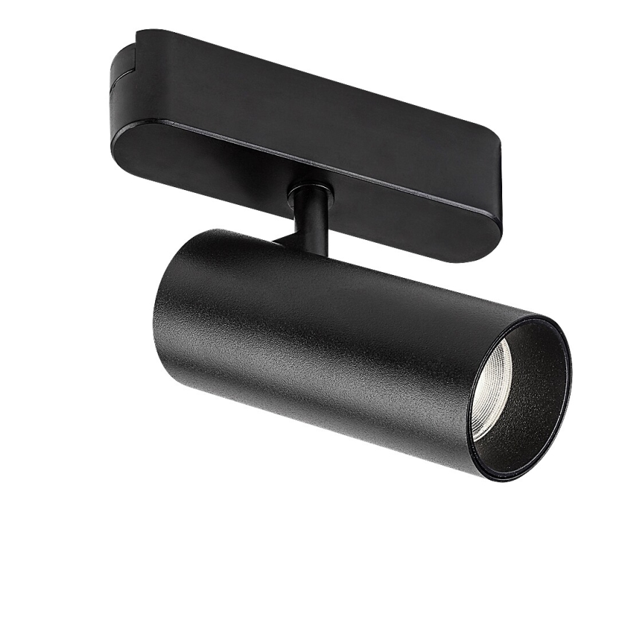 Svietidlo svieti. Je čierne, valcovitého tvaru, pripevnené k obdĺžnikovému držiaku na stenu. Svetlo smeruje dopredu a mierne nadol.