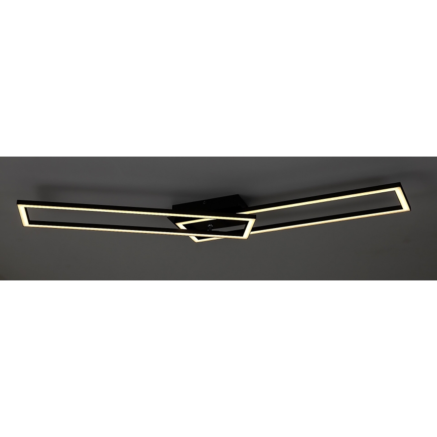 Svietidlo svieti na strope. Je čiernej farby a skladá sa z troch prepletených obdĺžnikových rámov s vnútorným LED osvetlením. Rámy sú pripevnené k štvorcovej základni.