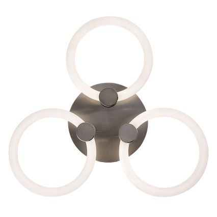 Nástené svietidlo s tromi kruhovými LED prvkami, pripevnené k okrúhlemu kovovému podstavcu. Svietidlo je strieborno-šedej farby.