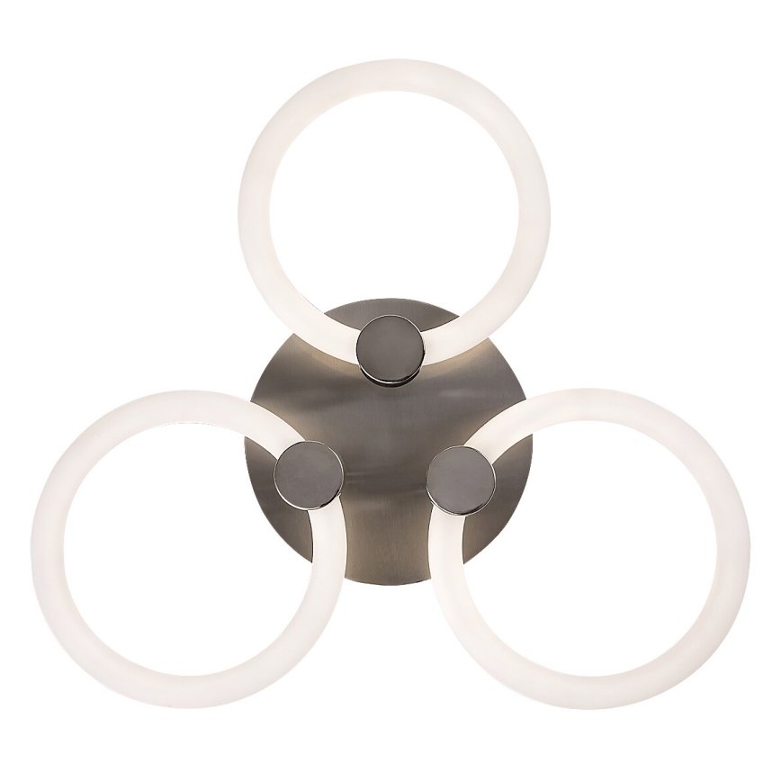 Nástené svietidlo s tromi kruhovými LED prvkami, pripevnené k okrúhlemu kovovému podstavcu. Svietidlo je strieborno-šedej farby.