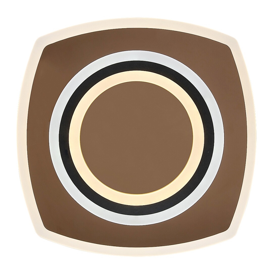 Štvorcový tanier s mierne zaoblenými rohmi je zdobený koncentrickými kruhmi v hnedých, zlatých, čiernych a sivých odtieňoch. Tanier je umiestnený na bielom pozadí.