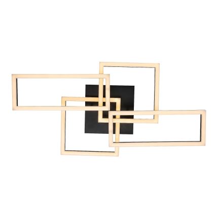 Svietidlo svieti. Je zložené z prepletených obdĺžnikových a štvorcových rámov s LED osvetlením, pripevnených na čiernu štvorcovú základňu. Celok je umiestnený na bielom pozadí.