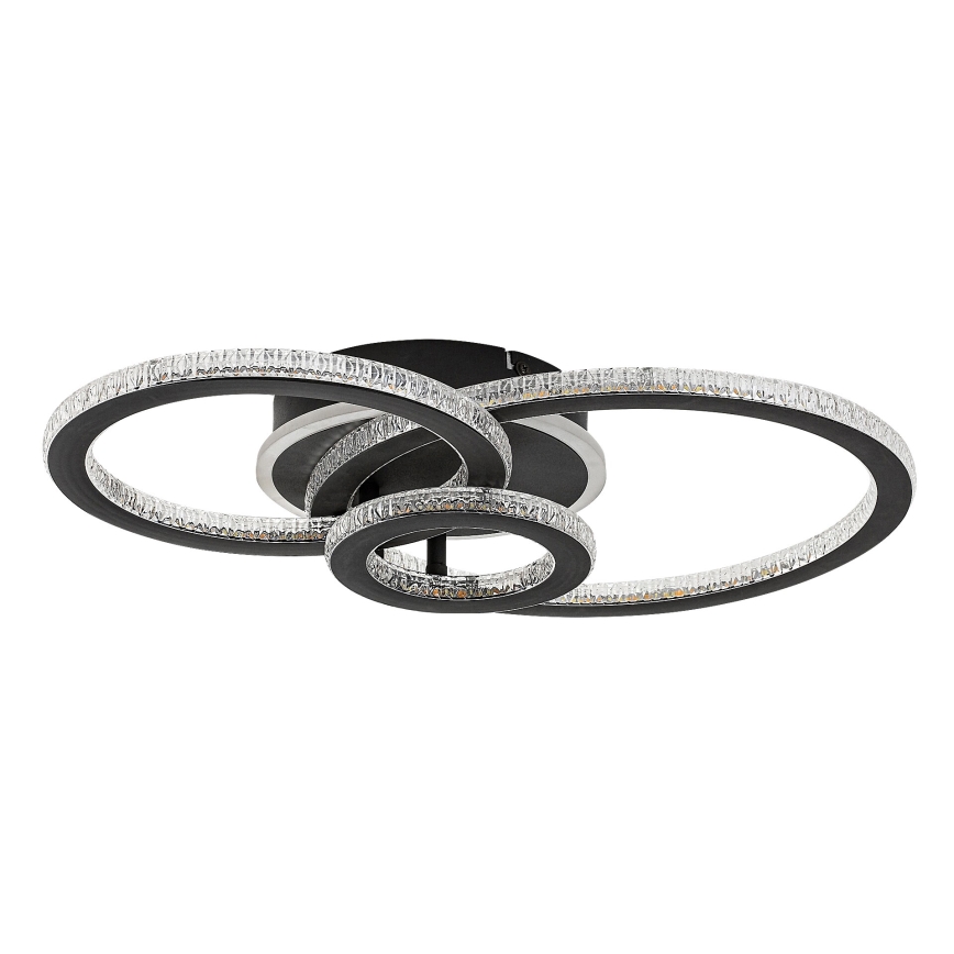 Svietidlo s prepletenými kruhmi osvetľuje priestor. Kruhy sú lemované kryštálmi. Stropné svietidlo je v čiernej farbe.