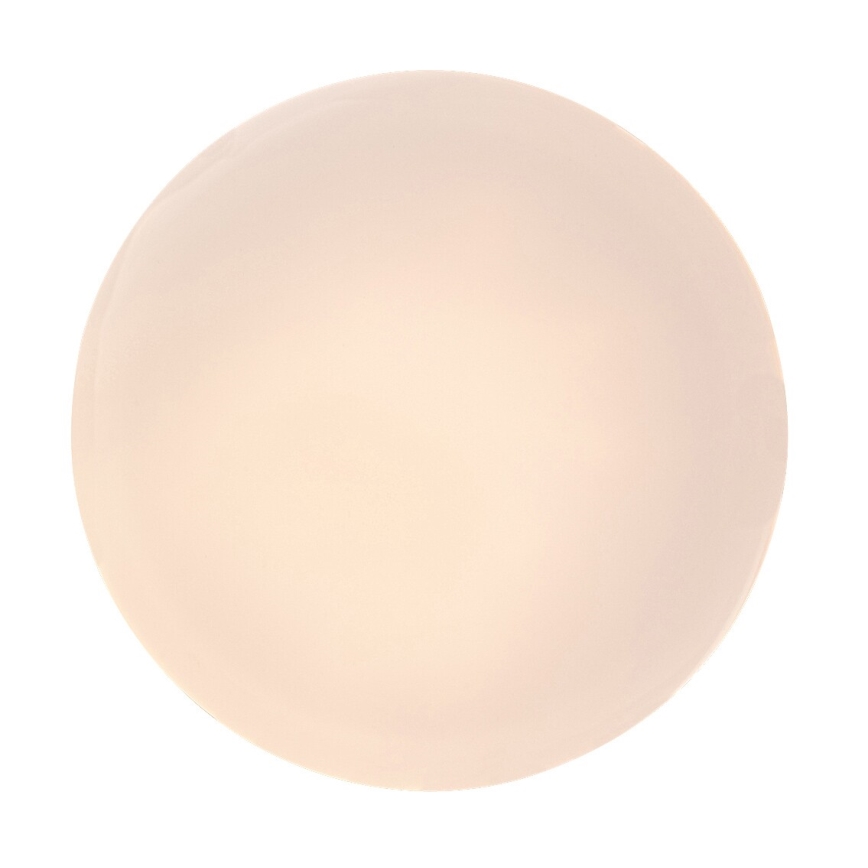 Guľaté svietidlo svieti. Je svetložltej farby. Na bielom pozadí.