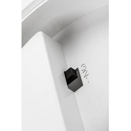 Biely plastový kryt, na ktorom je viditeľný čierny prepínač s označením „Ø24“.