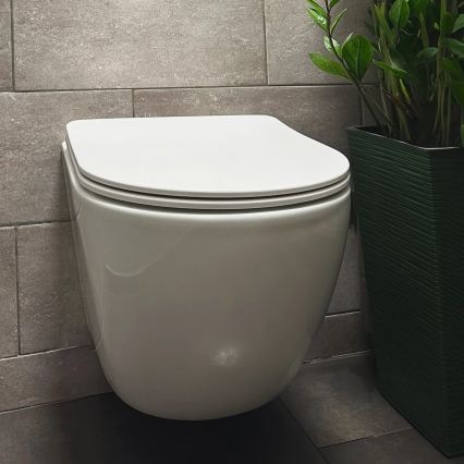 REA-C1259 - Závesné WC s WC sedátkom CARLO MINI TORNADO RIMLESS keramika/lesklá biela
