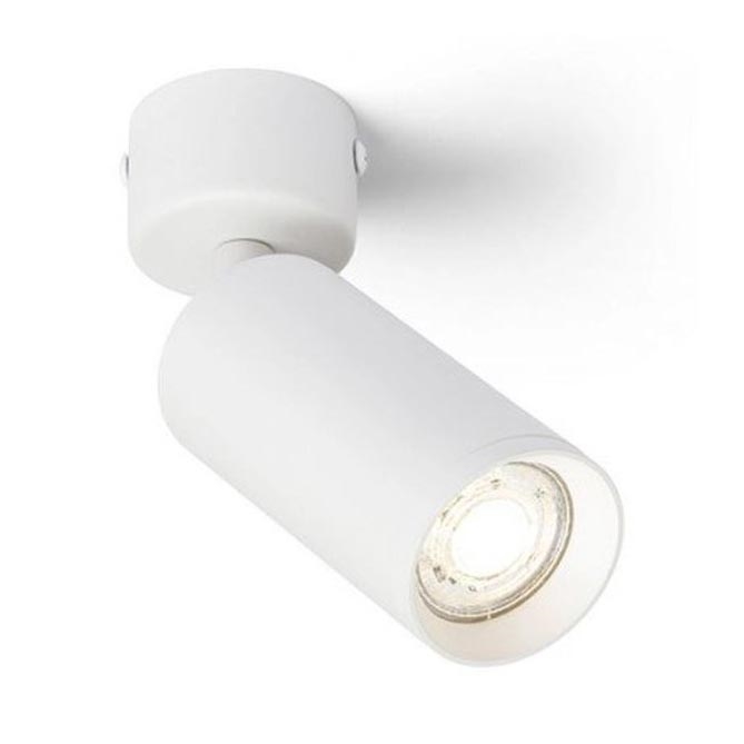 Biela nástenná lampa s valcovým telom smeruje svetlo doprava. Lampa je pripevnená k stropu. Svetlo pochádza z LED diódy umiestnenej v prednej časti valca.