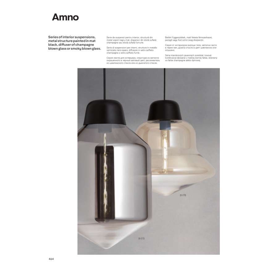 Dve závesné svietidlá s matne čiernou kovovou konštrukciou a difúzormi zo skla – šampanského alebo dymového. Svietidlá visia na sivom pozadí. Text uvádza: „Series of interior suspensions. metal structure painted in mat black, diffuser of champagne blown glass or smoky blown glass.“