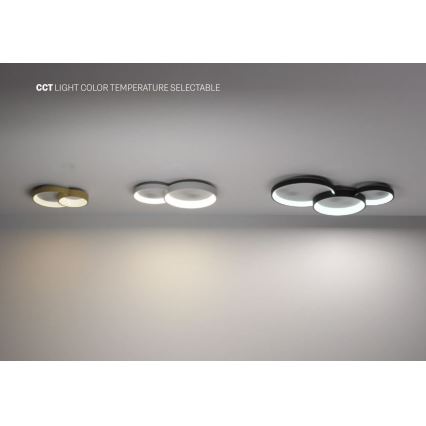 Tri stropné svietidlá s premenlivou teplotou svetla sú pripevnené k stropu. Svietidlá sú v zlatej, bielej a čiernej farbe. Text na obrázku: CCT LIGHT COLOR TEMPERATURE SELECTABLE.