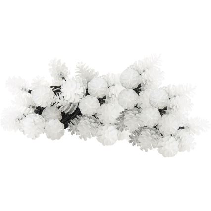 Svetelný reťaz s bielymi šiškami je stočený na bielom pozadí. Šišky sú pripevnené k čiernemu káblu.