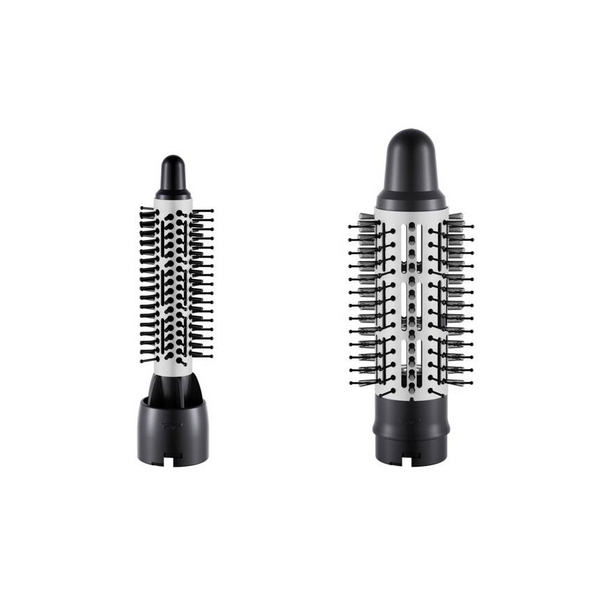 Dve kulmy na vlasy s rôznou veľkosťou kefy stoja na bielom pozadí. Menšia kefa má husté štetiny, väčšia kefa má štetiny usporiadané okolo otvorov. Obe sú prevažne čierne a strieborné.