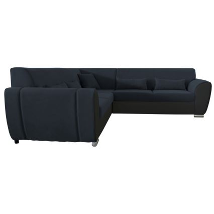 Rohová sedačka v tvare L je zobrazená na bielom pozadí. Sedačka je čalúnená tmavomodrou látkou a čiernou koženkou. Má tri vankúše.