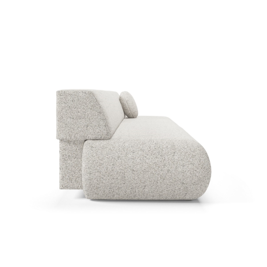 Svetlosivá pohovka s valcovitým tvarom a opierkou, na ktorej je položený vankúš, je zobrazená zboku na bielom pozadí.