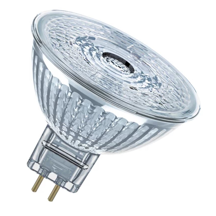 LED žiarovka s priehľadným skleneným telom a dvoma zlatými kontaktami na spodku. Žiarovka je umiestnená na bielom pozadí.