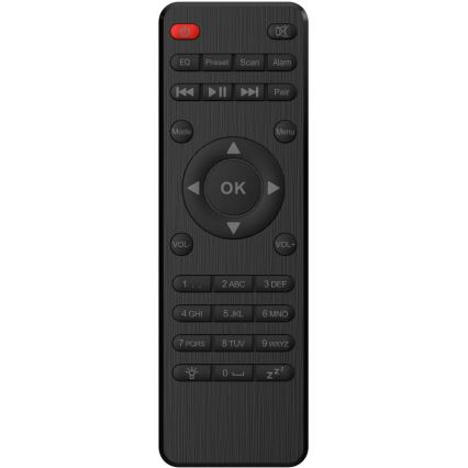 Diaľkový ovládač zobrazuje tlačidlá pre ovládanie hlasitosti, kanálov, režimov, párovanie a čísla. Obsahuje aj tlačidlá pre písmená a funkcie ako EQ, Preset, Scan, Alarm, Mode a Menu. Je čierny s textúrou dreva.