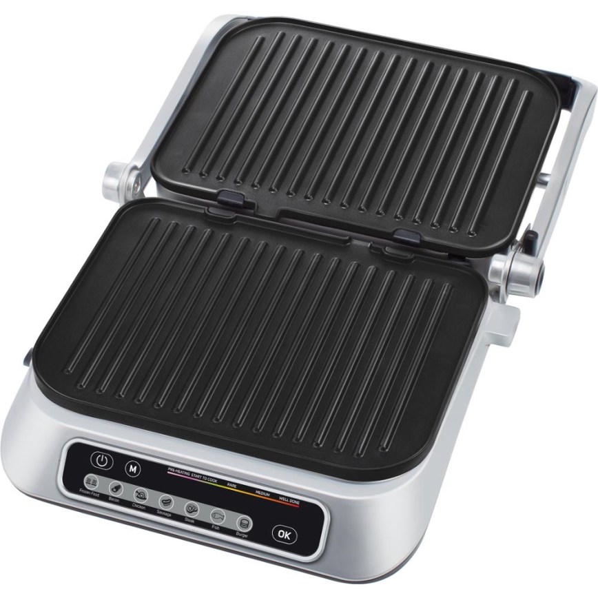 Elektrický gril s otváracími grilovacími plochami je pripravený na použitie. Ovládací panel obsahuje tlačidlá pre rôzne druhy potravín (Steak, kuracie, klobása, ryby, hamburger) a nastavenie prepečenia (rare, medium, medium well, well done).