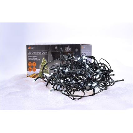 LED vianočná girlanda leží na umelom snehu vedľa krabice. Na krabici je nápis: „LED Christmas Chain“, „Warmwhite LED lights“, „60x LED“, „10m“, „8 functions“.