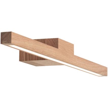 Drevená nástenná lampa s LED osvetlením, pripevnená k stene, svieti. Lampa má obdĺžnikový tvar z masívneho dreva.