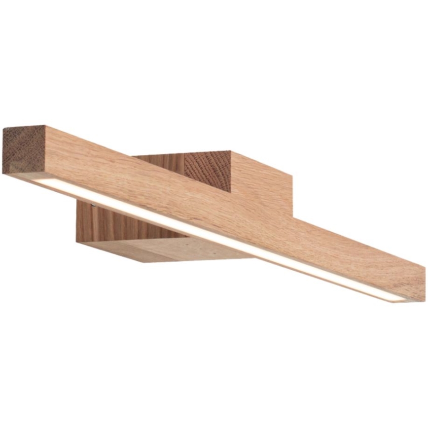 Drevená nástenná lampa s LED osvetlením, pripevnená k stene, svieti. Lampa má obdĺžnikový tvar z masívneho dreva.