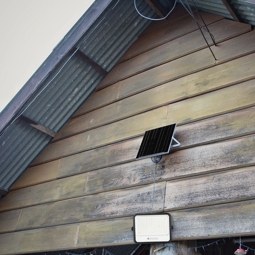 LED stmievateľný solárny reflektor LED/400W/3,2V 2000-8000K IP65 20000 mAh čierna + diaľkové ovládanie