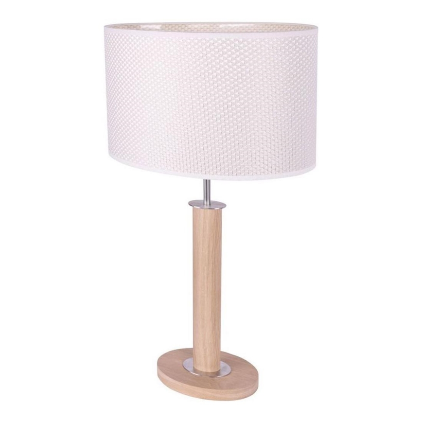 Stolová lampa s drevenou nohou a oválnym svetlom stojí na bielom pozadí. Svetlo má valcovitý tienidlo zo svetlej textílie s prepleteným vzorom.